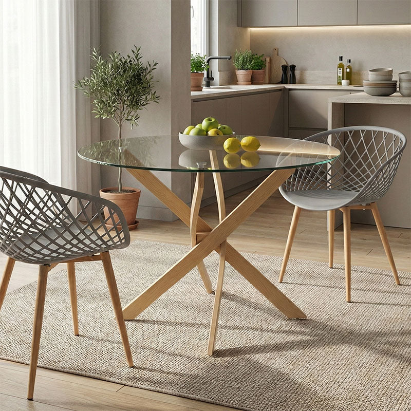 Модерна кружна трпезариска маса Table Xenoux со проширена горна површина од калено проѕирно стакло и цврсти метални ногарки во природна нијанса со ефект на дрво