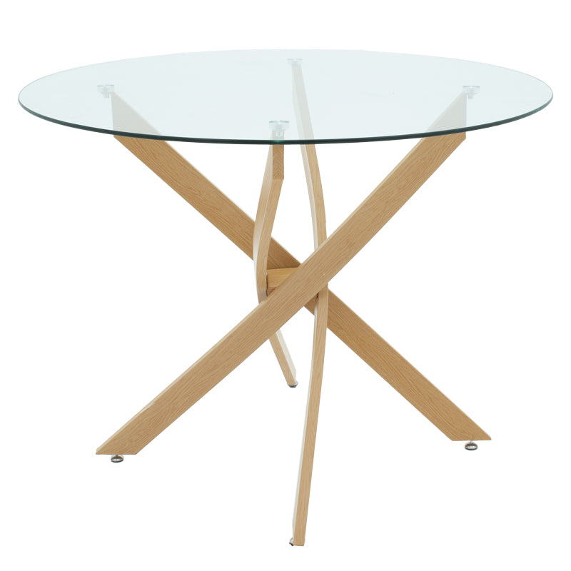 Модерна кружна трпезариска маса Table Xenoux со проширена горна површина од калено проѕирно стакло и цврсти метални ногарки во природна нијанса со ефект на дрво